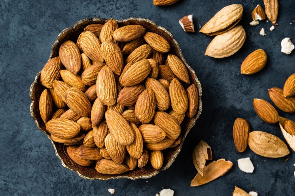 Almond nuts in bowl. Almonds