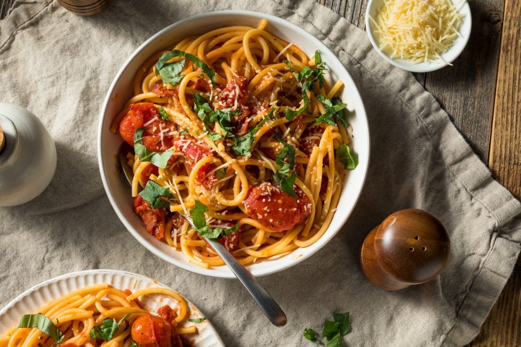 Homemade Bucatini all Amatriciana Pasta with Tomato and Basil