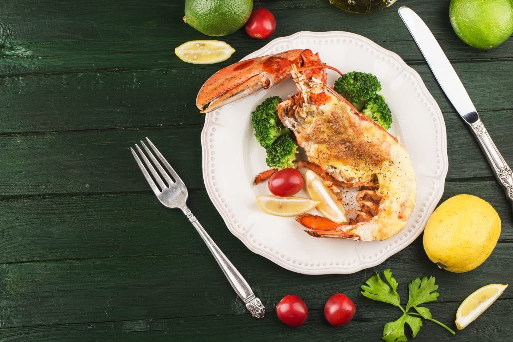 Lobster Thermidor, grilled lobster stuffed with cream and cheese