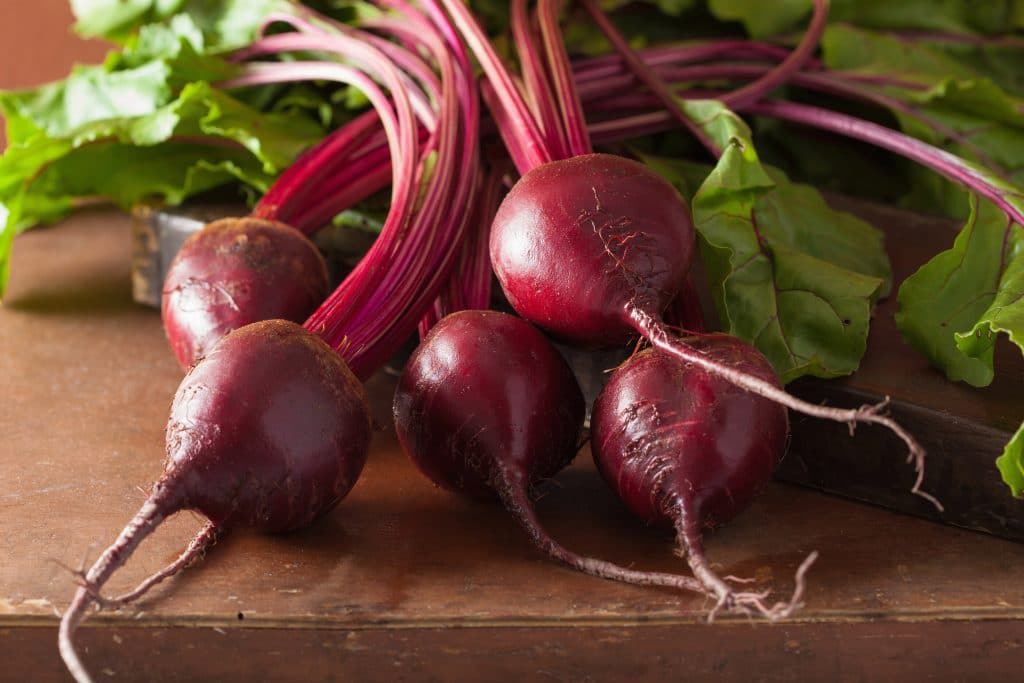 fresh beetroot on wooden background