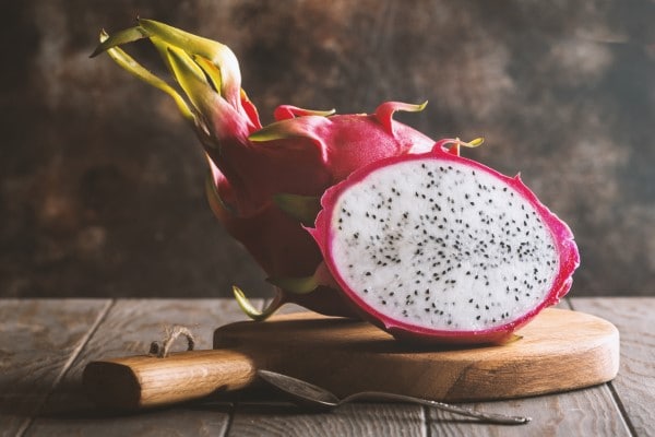Asian Dragon fruit on the wooden background